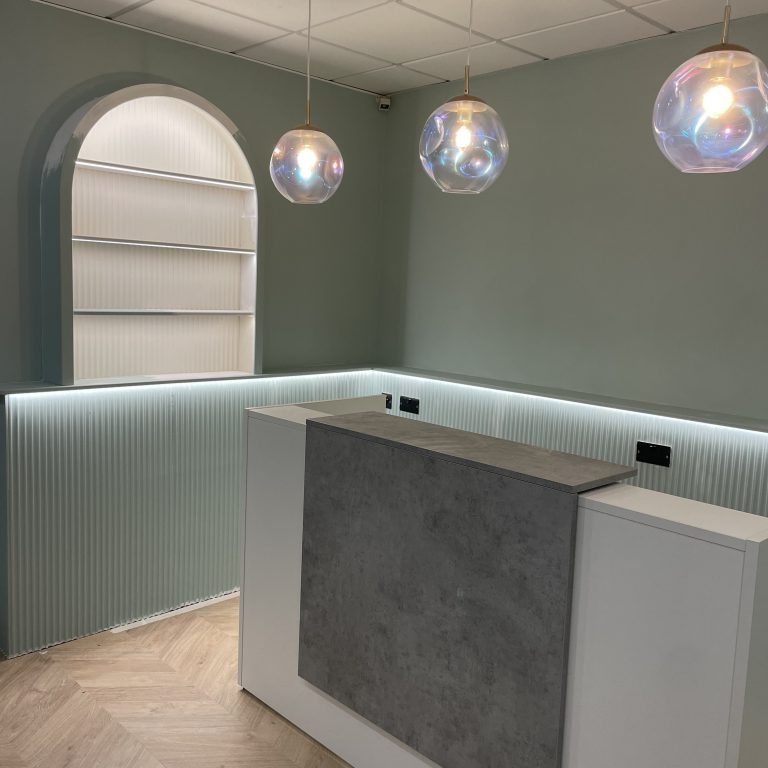 Aesthetic clinic lighting installation - after - reception